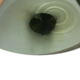 From under the toilet, a very cute girl pushes out a couple of thick logs that hang and drop into the bowl, followed by the product. Filmed from a between the legs perspective. Vertical format video. Over a minute.